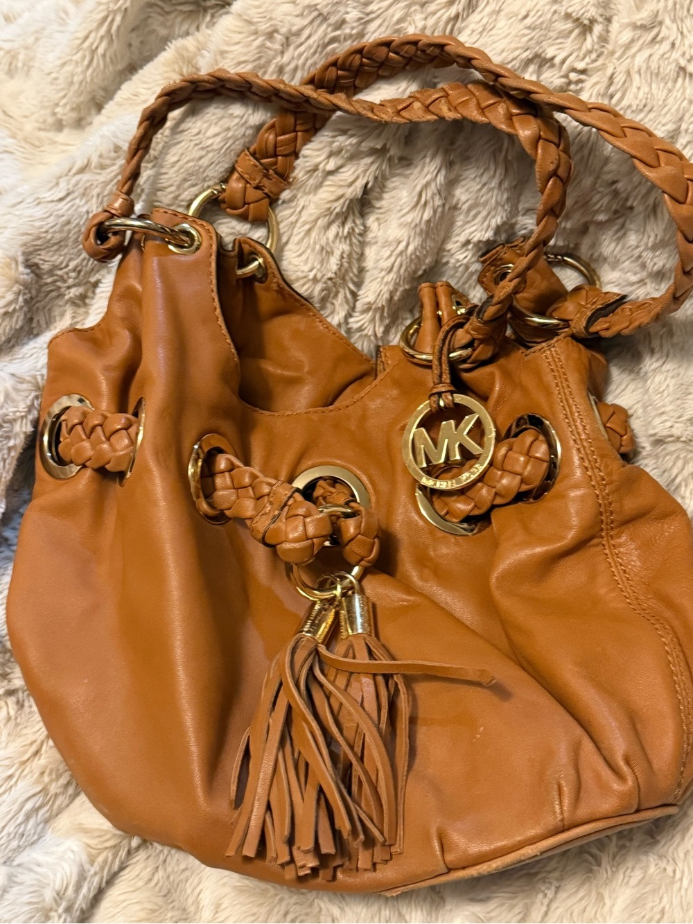 Micheal Kors tan scrunch hand bag
